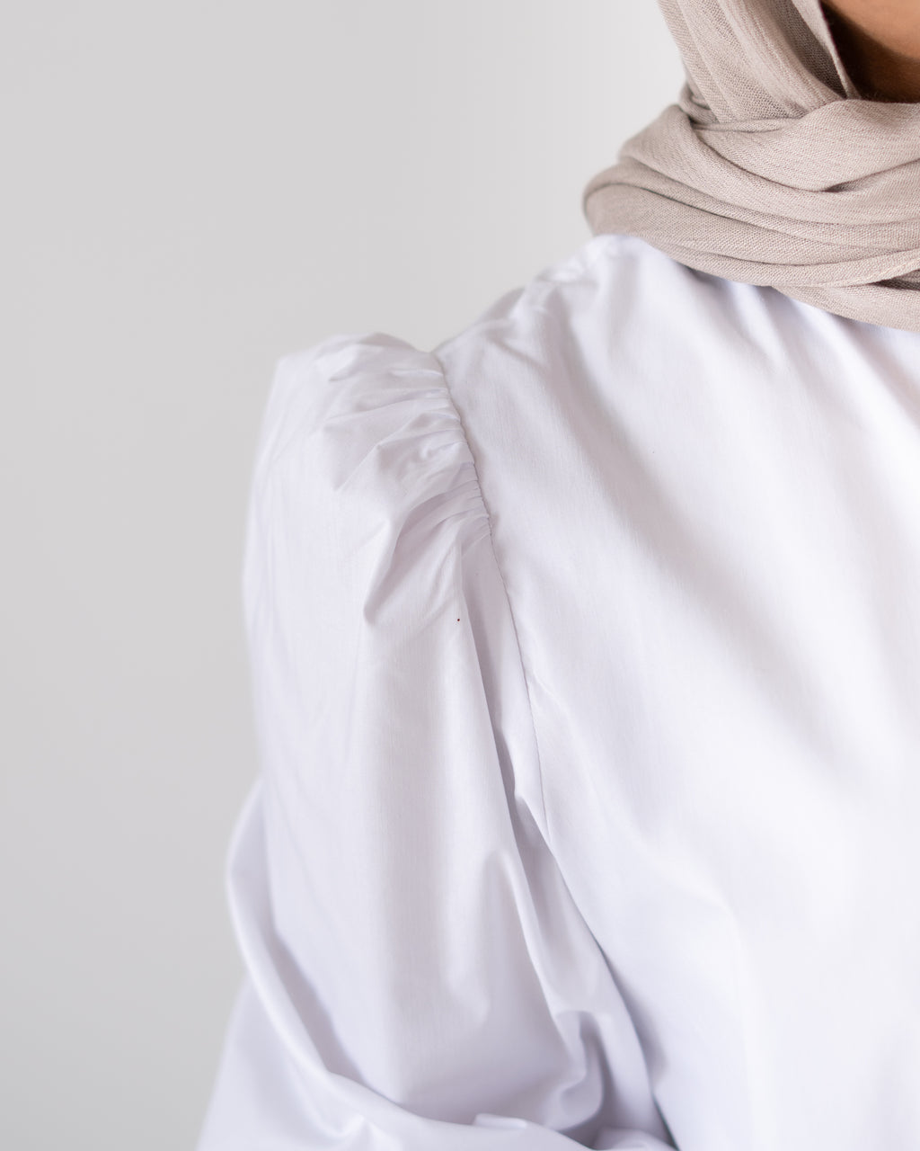 TILA Signature Puff Shirt